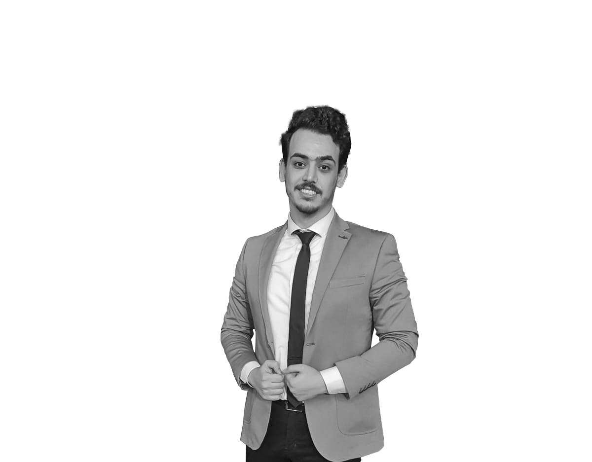 Ahmed Attia wearing a suit